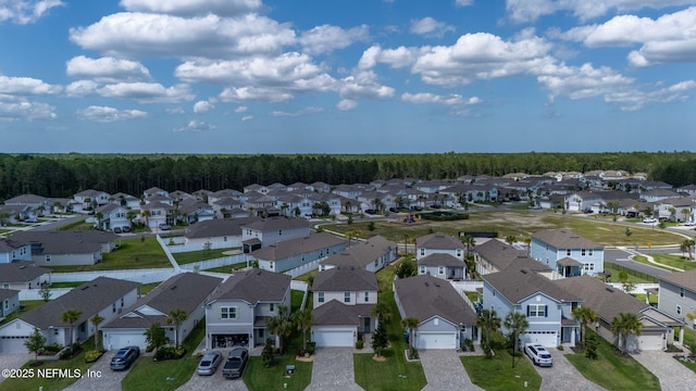 121 Thistleton Way, Saint Augustine, FL 32092 - aerial perspective of suburban area with a forest