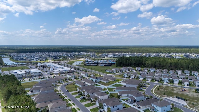 121 Thistleton Way, Saint Augustine, FL 32092 - aerial view of property and surrounding area with nearby suburban area and a large body of water
