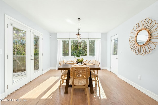415 Seminole Rd, Atlantic Beach, FL 32233 - dining area featuring plenty of natural light and light wood-style flooring
