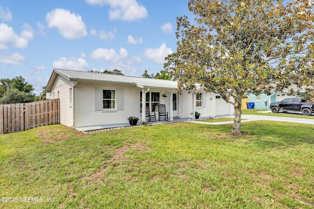 822 Valnera Ct, Saint Augustine, FL 32086 - ranch-style house with covered porch, concrete driveway, a garage, and metal roof