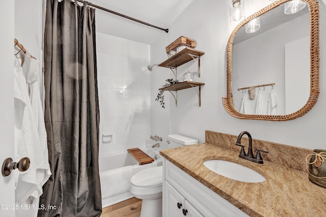 822 Valnera Ct, Saint Augustine, FL 32086 - full bath featuring vanity, toilet, shower / tub combo with curtain, and wood finished floors