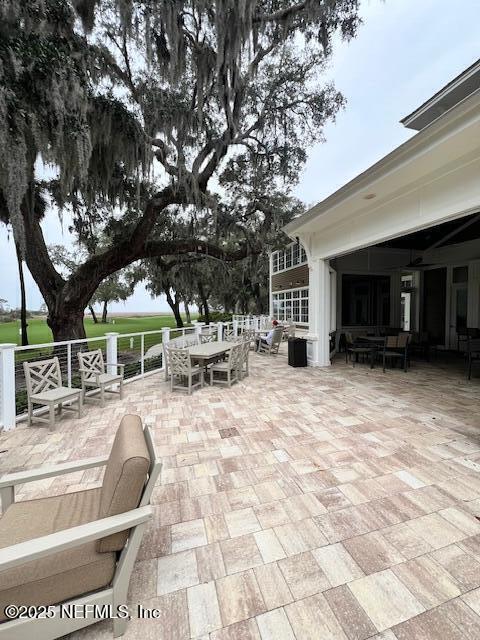 1829 Turtle Dunes Pl Unit 1829, Fernandina Beach, FL 32034 - view of patio / terrace featuring outdoor dining space