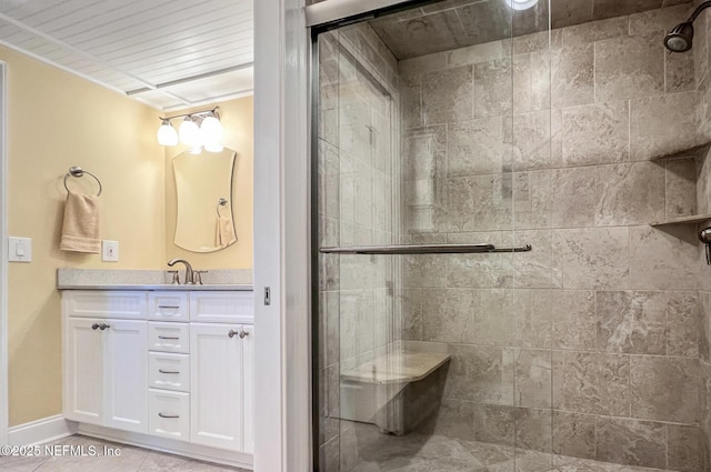 1829 Turtle Dunes Pl Unit 1829, Fernandina Beach, FL 32034 - bathroom with a stall shower, vanity, crown molding, baseboards, and tile patterned flooring