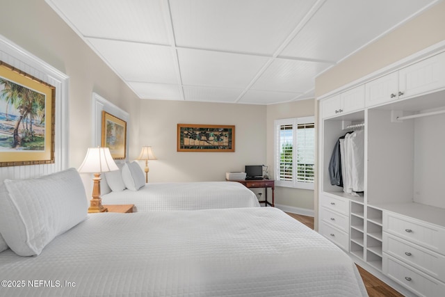 1829 Turtle Dunes Pl Unit 1829, Fernandina Beach, FL 32034 - bedroom with dark wood-style flooring and baseboards
