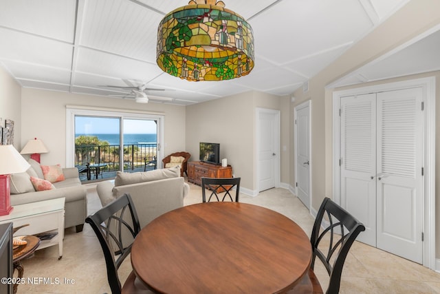 1829 Turtle Dunes Pl Unit 1829, Fernandina Beach, FL 32034 - dining room with a ceiling fan, light tile patterned flooring, and baseboards
