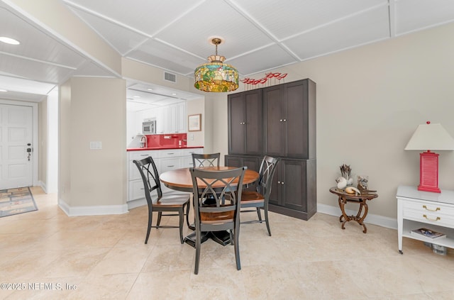 1829 Turtle Dunes Pl Unit 1829, Fernandina Beach, FL 32034 - dining room with baseboards and light tile patterned floors