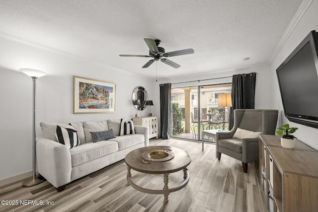5811 Atlantic Blvd Unit 153, Jacksonville, FL 32207 - living area with light wood-style flooring, crown molding, ceiling fan, a textured ceiling, and baseboards
