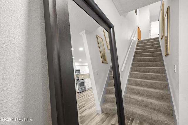 5811 Atlantic Blvd Unit 153, Jacksonville, FL 32207 - stairway with wood finished floors, baseboards, and recessed lighting