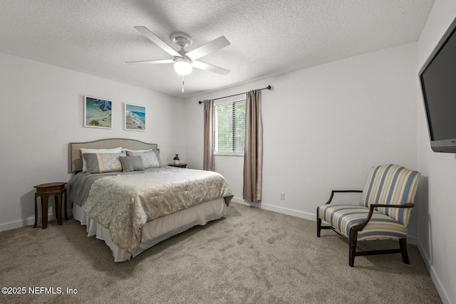5811 Atlantic Blvd Unit 153, Jacksonville, FL 32207 - bedroom with light colored carpet, a textured ceiling, a ceiling fan, and baseboards