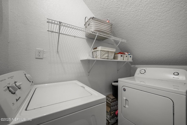 5811 Atlantic Blvd Unit 153, Jacksonville, FL 32207 - laundry area with washing machine and dryer and a textured wall