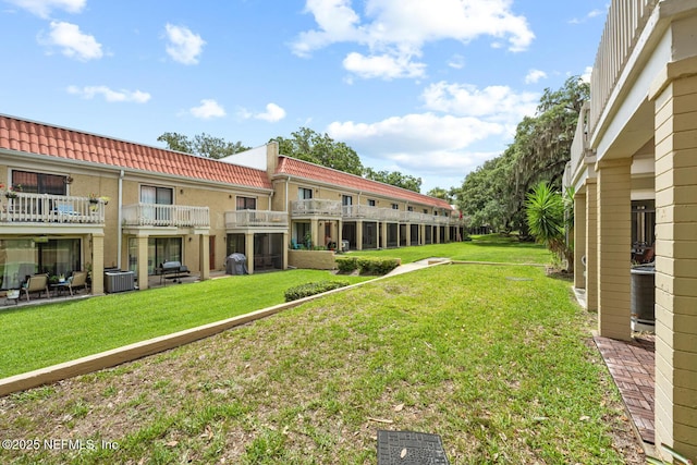 5811 Atlantic Blvd Unit 153, Jacksonville, FL 32207 - view of grassy yard with central air condition unit