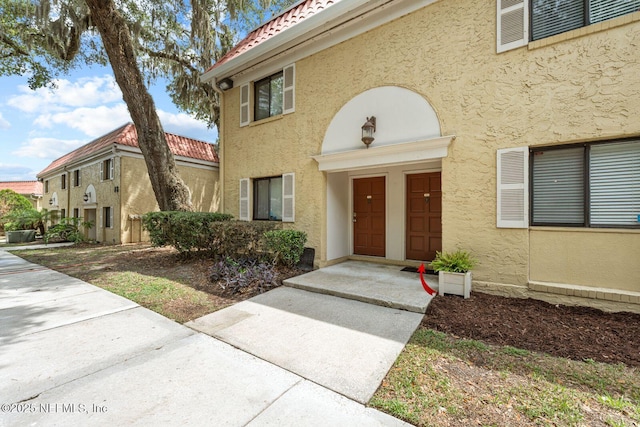 5811 Atlantic Blvd Unit 153, Jacksonville, FL 32207 - property entrance featuring stucco siding