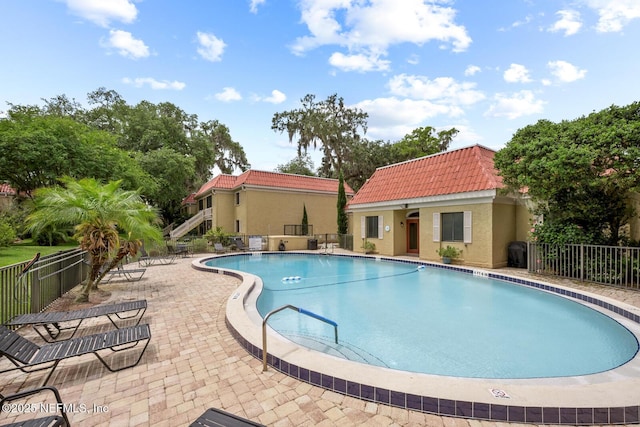 5811 Atlantic Blvd Unit 153, Jacksonville, FL 32207 - community pool with a patio area and stairway