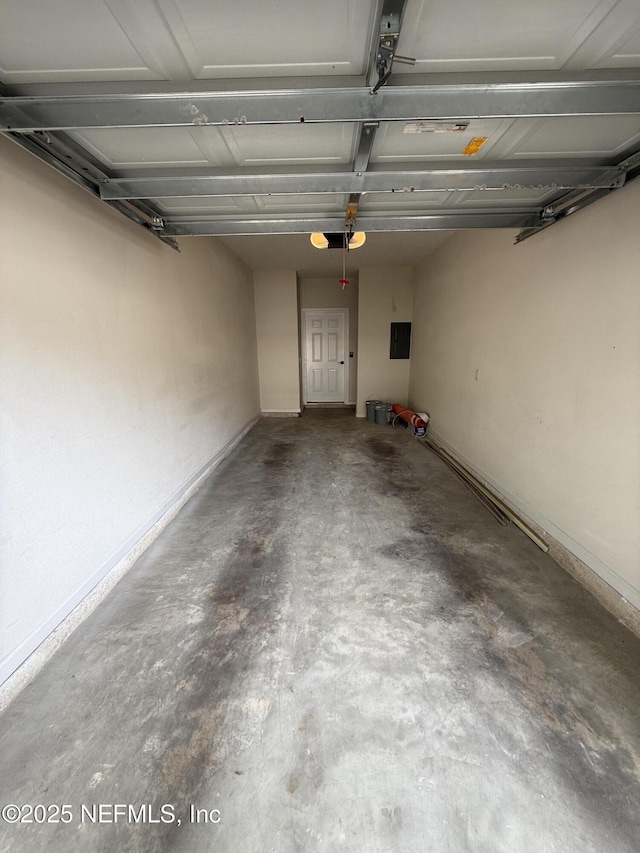 1735 Forest Lake Cir W Unit 2, Jacksonville, FL 32225 - garage with baseboards