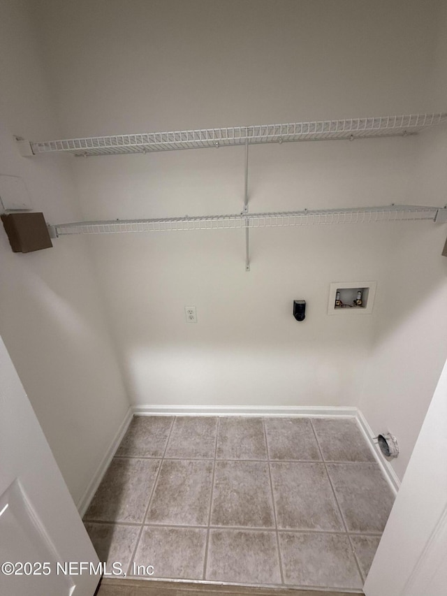 1735 Forest Lake Cir W Unit 2, Jacksonville, FL 32225 - laundry room featuring washer hookup, hookup for an electric dryer, tile patterned flooring, and baseboards