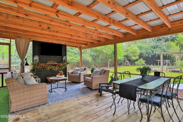 7265 Beach Rd, Elkton, FL 32033 - wooden terrace with an outdoor hangout area and outdoor dining area