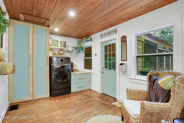 7265 Beach Rd, Elkton, FL 32033 - washroom with washer / dryer, wooden ceiling, light wood-style floors, and recessed lighting