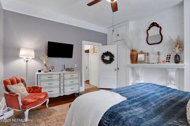 7265 Beach Rd, Elkton, FL 32033 - bedroom with wood finished floors and ceiling fan