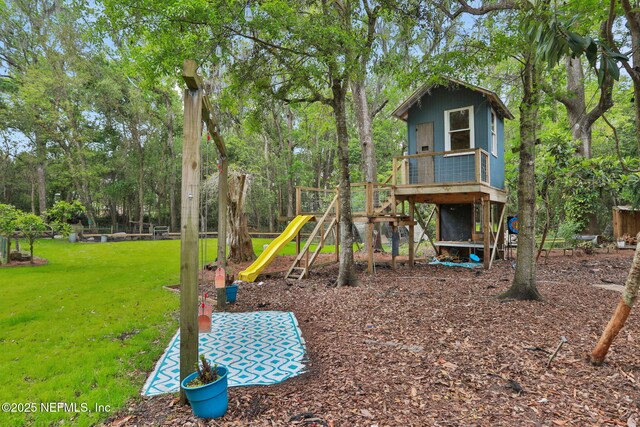 7265 Beach Rd, Elkton, FL 32033 - view of playground featuring a lawn and view of scattered trees