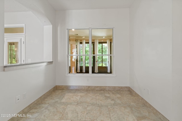 2305 Range Crescent Ct, Fleming Island, FL 32003 - unfurnished room featuring plenty of natural light and baseboards