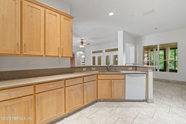 2305 Range Crescent Ct, Fleming Island, FL 32003 - kitchen with white dishwasher, a sink, light brown cabinetry, a ceiling fan, and a peninsula