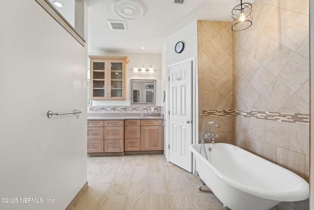 2305 Range Crescent Ct, Fleming Island, FL 32003 - full bath featuring a freestanding bath and vanity