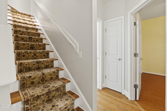 2305 Range Crescent Ct, Fleming Island, FL 32003 - staircase featuring wood finished floors and baseboards