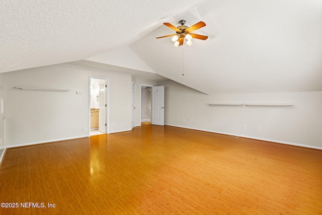 2305 Range Crescent Ct, Fleming Island, FL 32003 - bonus room with lofted ceiling, ceiling fan, baseboards, and wood finished floors