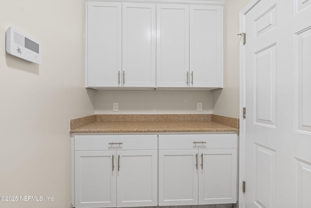 2305 Range Crescent Ct, Fleming Island, FL 32003 - kitchen featuring white cabinetry and light countertops
