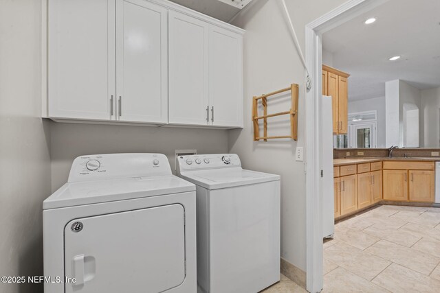 2305 Range Crescent Ct, Fleming Island, FL 32003 - laundry room featuring washing machine and dryer, cabinet space, and recessed lighting