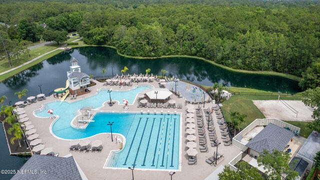 2305 Range Crescent Ct, Fleming Island, FL 32003 - aerial view of a heavily wooded area, a pool area, and a nearby body of water