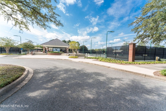 2305 Range Crescent Ct, Fleming Island, FL 32003 - view of asphalt street with sidewalks, street lighting, and curbs