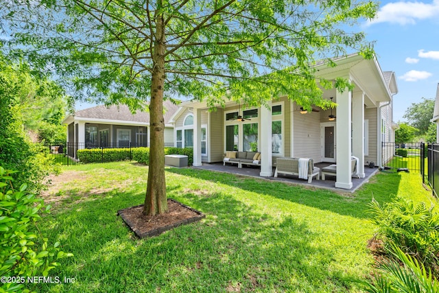 80 Atlas Dr, Saint Augustine, FL 32092 - back of property with ceiling fan, an outdoor hangout area, and a patio