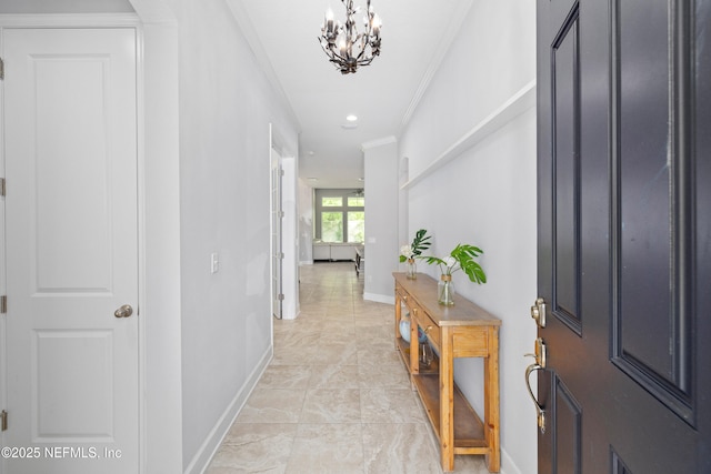 80 Atlas Dr, Saint Augustine, FL 32092 - entryway with ornamental molding, a chandelier, and baseboards
