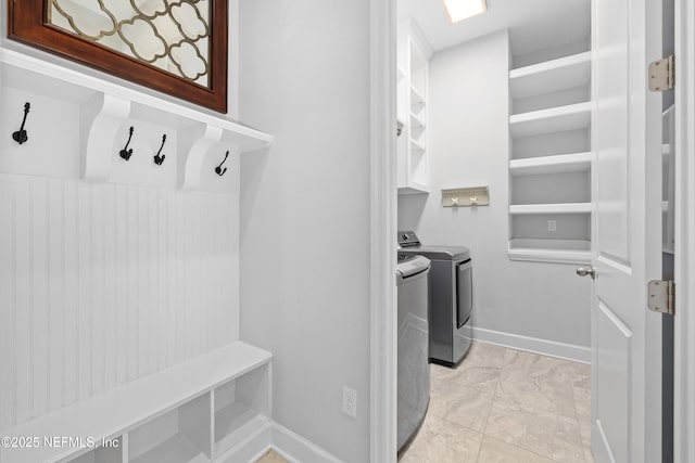 80 Atlas Dr, Saint Augustine, FL 32092 - mudroom with washing machine and dryer and light marble finish floors