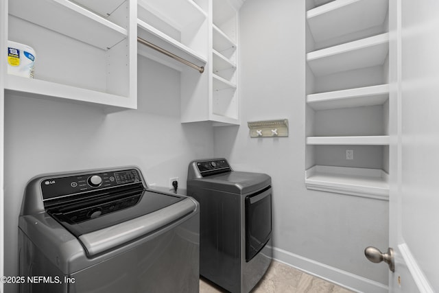 80 Atlas Dr, Saint Augustine, FL 32092 - laundry room with separate washer and dryer and baseboards