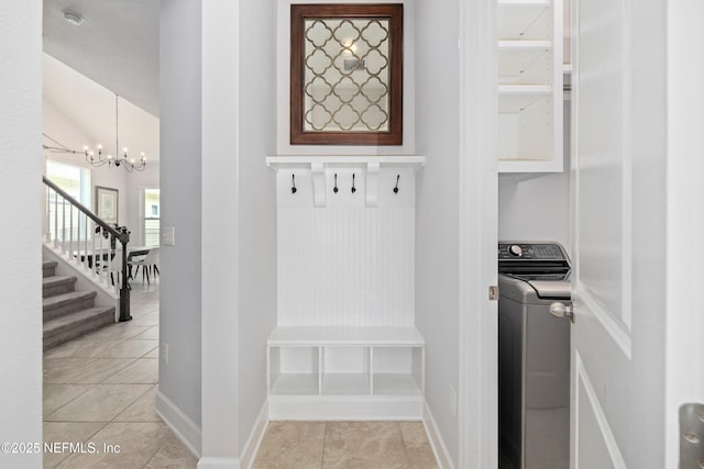 80 Atlas Dr, Saint Augustine, FL 32092 - mudroom with washer / dryer, a chandelier, light tile patterned floors, baseboards, and vaulted ceiling