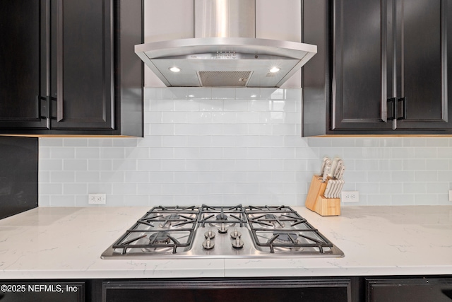 80 Atlas Dr, Saint Augustine, FL 32092 - kitchen featuring island range hood, stainless steel gas cooktop, backsplash, and light stone countertops