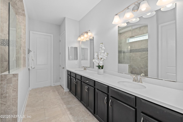 80 Atlas Dr, Saint Augustine, FL 32092 - bathroom featuring double vanity, walk in shower, and baseboards