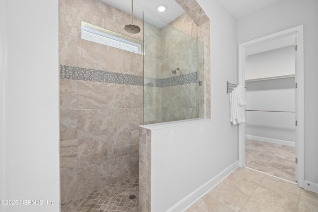 80 Atlas Dr, Saint Augustine, FL 32092 - full bathroom featuring walk in shower, a spacious closet, and baseboards