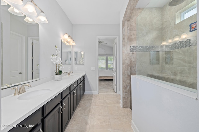80 Atlas Dr, Saint Augustine, FL 32092 - bathroom featuring ensuite bathroom, double vanity, a walk in shower, baseboards, and ceiling fan