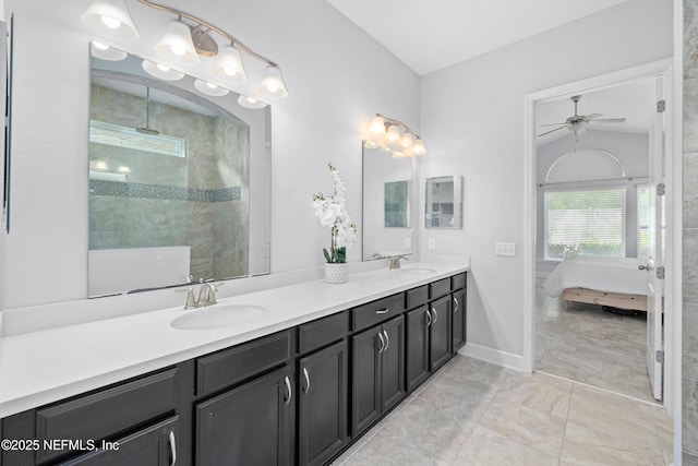 80 Atlas Dr, Saint Augustine, FL 32092 - bathroom with a ceiling fan, connected bathroom, double vanity, a walk in shower, and marble finish flooring