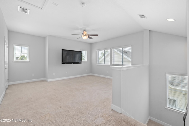 80 Atlas Dr, Saint Augustine, FL 32092 - unfurnished room featuring plenty of natural light, light carpet, baseboards, and vaulted ceiling