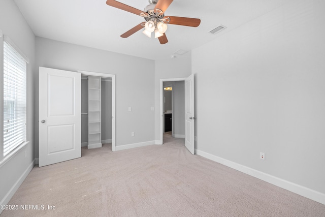 80 Atlas Dr, Saint Augustine, FL 32092 - unfurnished bedroom with light colored carpet, baseboards, a ceiling fan, and a closet