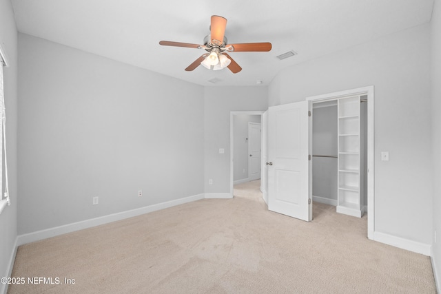 80 Atlas Dr, Saint Augustine, FL 32092 - unfurnished bedroom featuring light carpet, baseboards, a closet, and ceiling fan