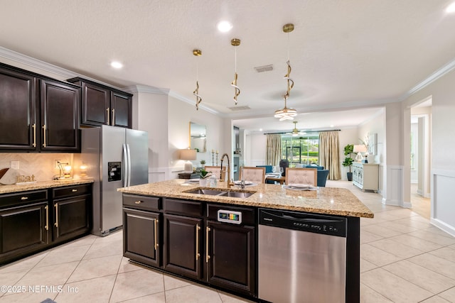33 Crown Colony Rd, Saint Augustine, FL 32092 - kitchen featuring stainless steel appliances, a sink, crown molding, light tile patterned floors, and a ceiling fan