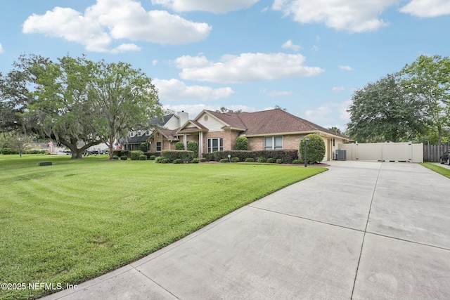 1816 Lakedge Dr, Middleburg, FL 32068 - view of front facade with driveway, brick siding, and a garage