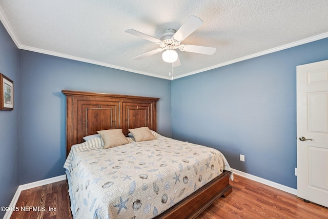 1816 Lakedge Dr, Middleburg, FL 32068 - bedroom with wood finished floors, baseboards, a ceiling fan, crown molding, and a textured ceiling