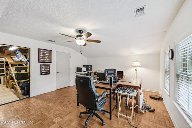 1816 Lakedge Dr, Middleburg, FL 32068 - office area with a ceiling fan, a textured ceiling, baseboards, healthy amount of natural light, and lofted ceiling