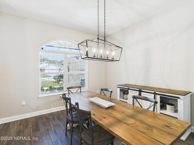 88137 Maybourne Rd, Yulee, FL 32097 - dining space featuring healthy amount of natural light, dark wood-type flooring, baseboards, and a chandelier